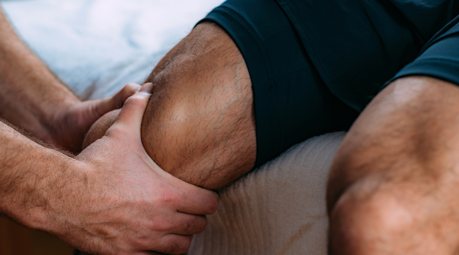 A woman stretching, indicating muscle recovery
